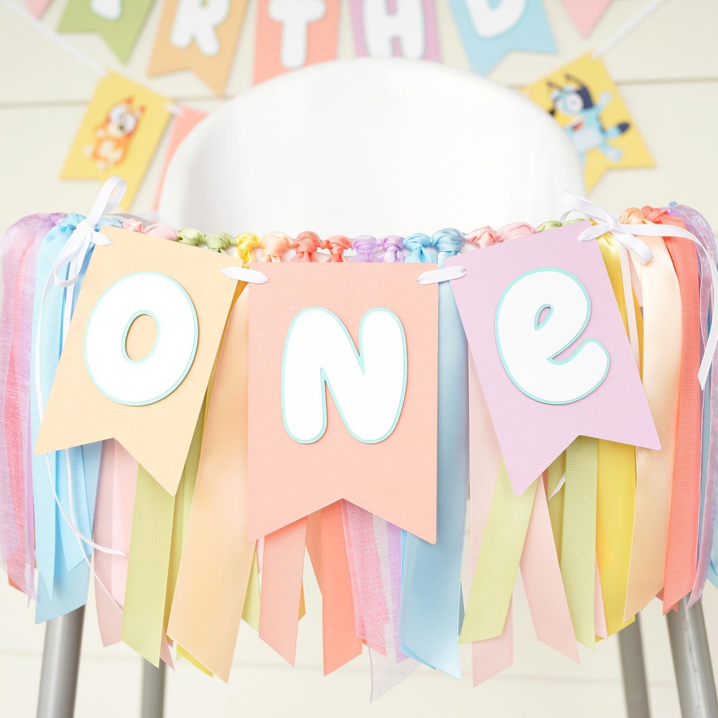Bluey High Chair Banner: 'ONE' or 'TWO' - Pastel Rainbow Ribbon Garland